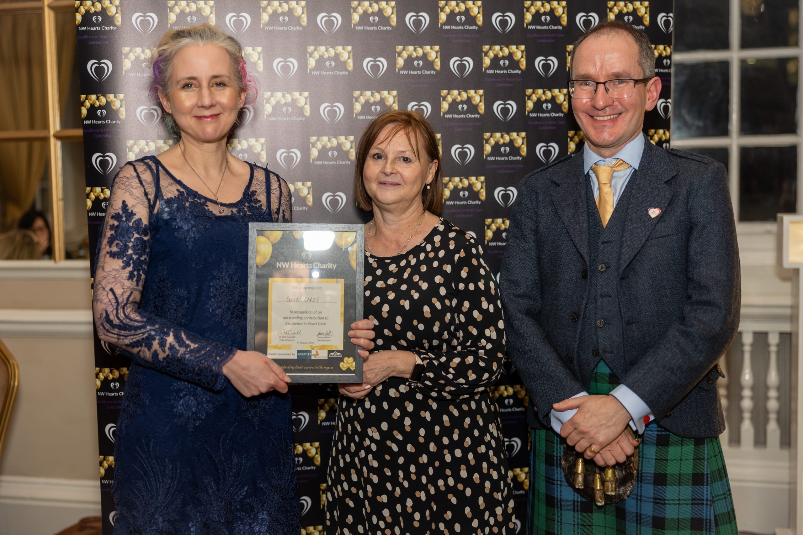 Award winner Emma Carey with Sue Martin and Dr Niall Campbell Award winner Emma Carey with Sue Martin and Dr Niall Campbell